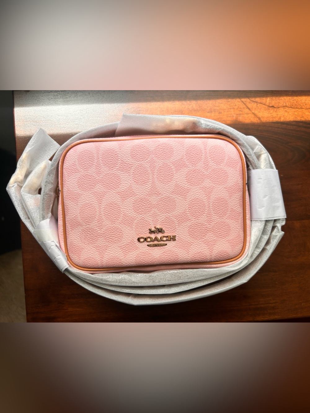 Coach Powder Pink Signature Crossbody Bag with brown straps